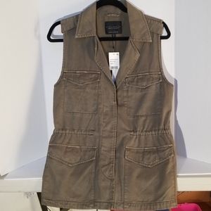 Dark green military utility vest